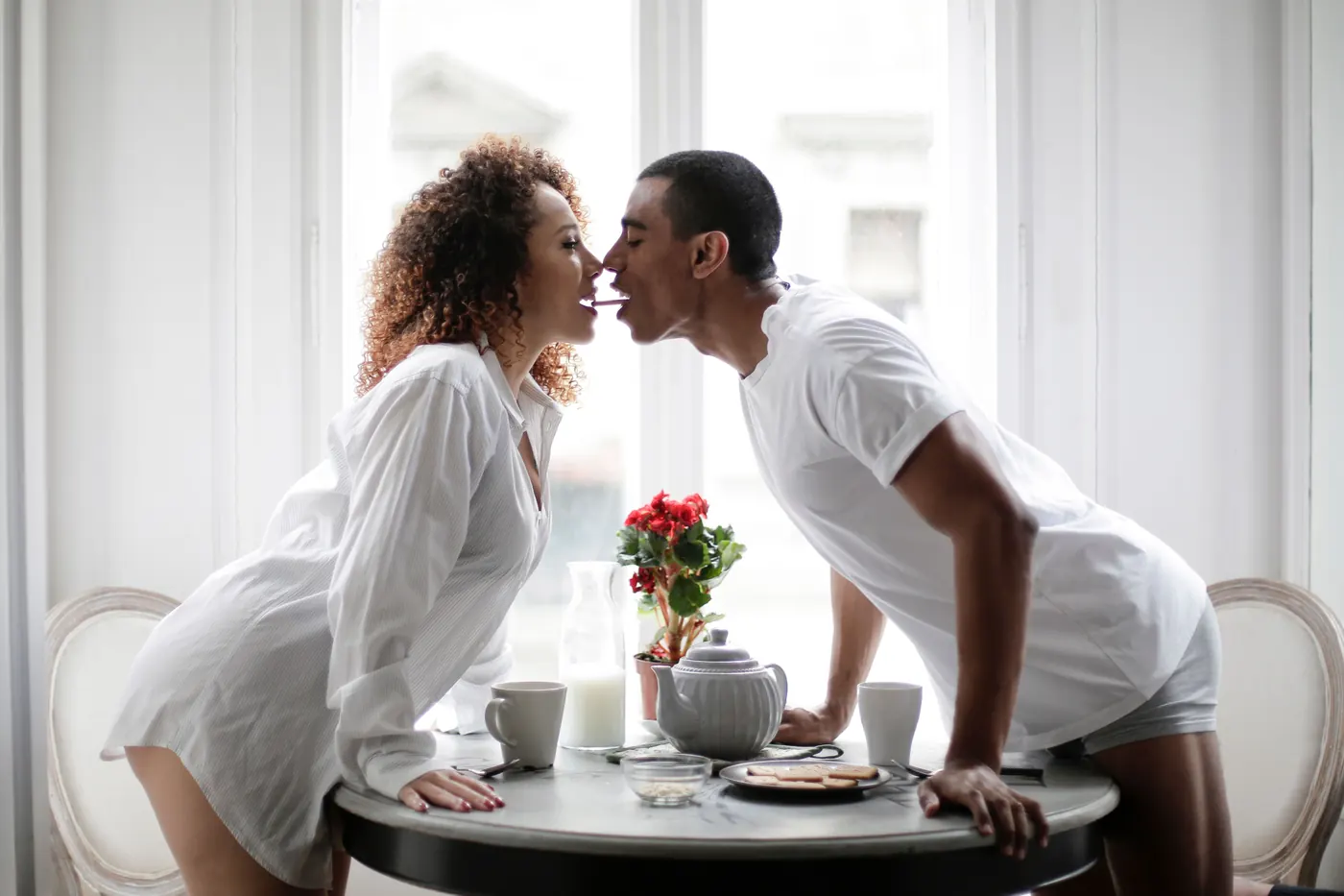 Illustrative stock photograph of an adult couple representing location-based hotwife dating